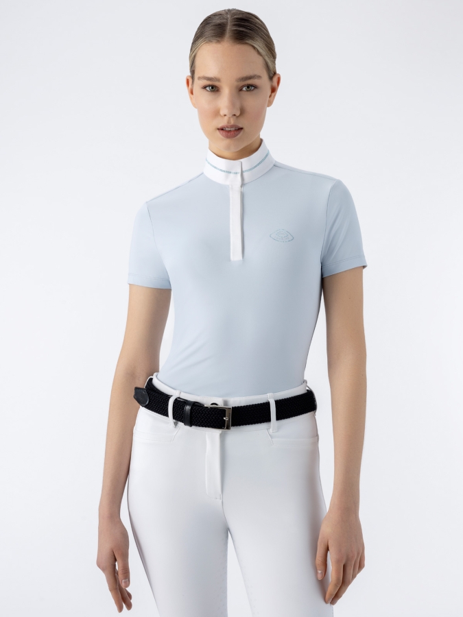 Polo competizione azzurra con dettaglio in microborchie da donna